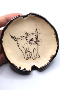 Image 1 of No surprises ashtray