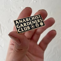 Image 1 of Anarchist Gardeners Club gold enamel pin badge