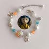 blue orange coraline charm bracelet