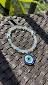 Image 1 of Opal Protection