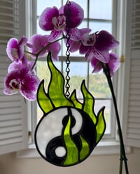 Image 4 of yin yang in green flames