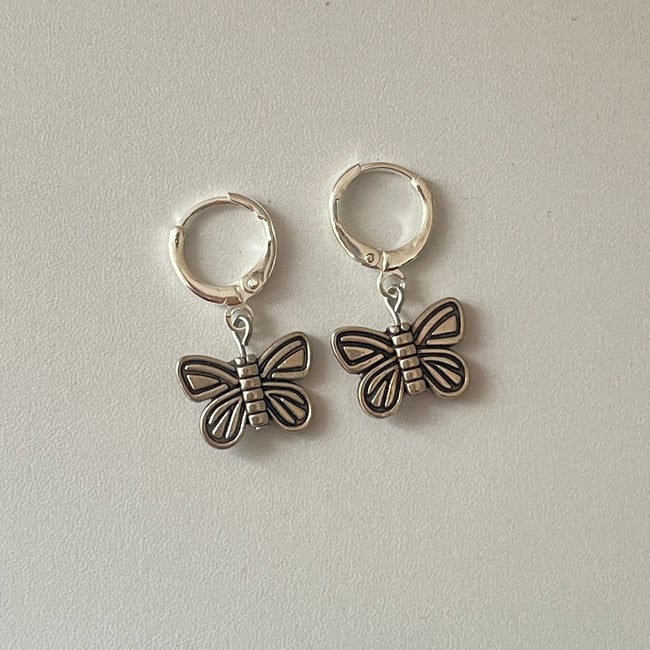 'butterfly' silver huggie hoop earrings