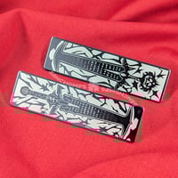 Image 1 of CRUCIBLE BLADES metal badges
