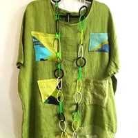 Image 1 of green linen tunic with sparkling accents