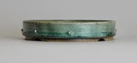Image 3 of Round studded bonsai pot in a copper glaze. d.144mm