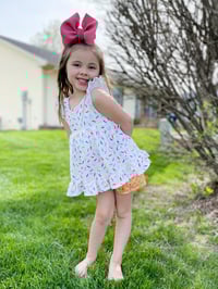 Image 2 of Party Print | dbl ruffle flutter sleeve | multiple prints
