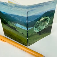Image 1 of vintage canada/agate postcard book