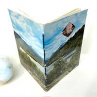 Image 1 of vintage canada evergreen postcard book