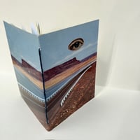 Image 2 of vintage eye/washington postcard book