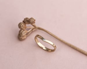 Image of 18ct yellow gold, 2mm milled edge wishbone ring