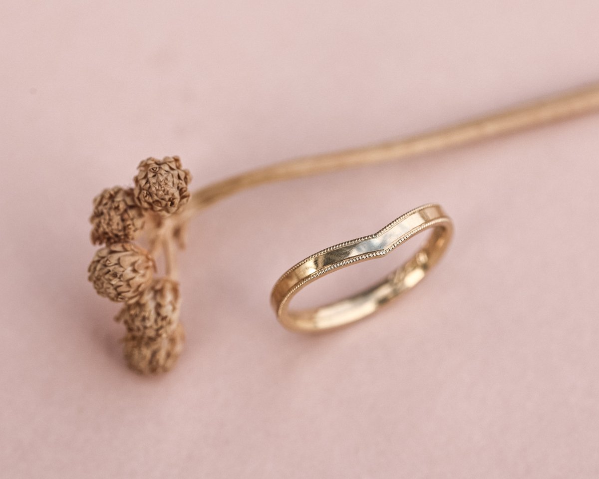 Image of 18ct yellow gold, 2mm milled edge wishbone ring