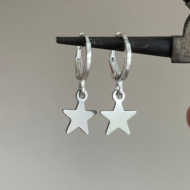 mini silver star huggie hoop earrings