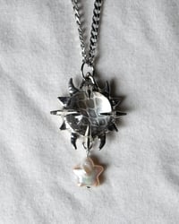 Image 3 of Silver Flare Charm