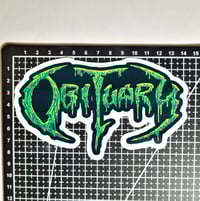 Image 2 of Large Green Glimmering Obiturary Band Logo Vinyl Sticker