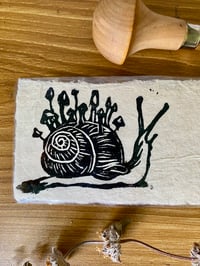 Image 2 of Fungus Snail linocut print laminated bookmark 