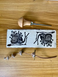 Image 1 of Fungus Snail linocut print laminated bookmark 