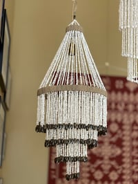 Grande suspension en coquillages 