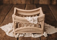 Image 1 of Bed in a peach color