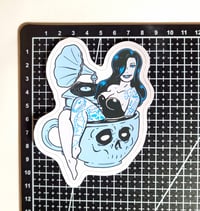 Image 2 of Pinup Girl In A Skull Teacup Matte Vinyl Sticker