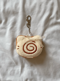 Image 1 of swirl kitty bread plushie keychain
