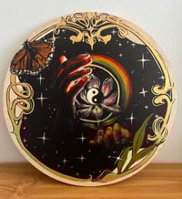 Image 2 of Held Between Worlds