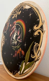 Image 4 of Held Between Worlds