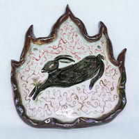 Image 1 of In a Trap