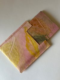 Image 2 of An A7 handmade eco printed notebook and protective cover pink and yellow