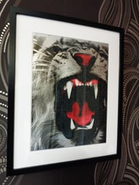 Image 1 of Silver Leaf Lion