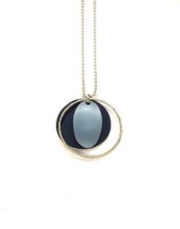 Blue disc and oval pendant