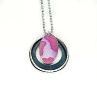 Pink pattern hoop pendant.
