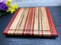 Image 1 of Padauk, Black Limba, and Cherry Cutting Board with Juice Groove