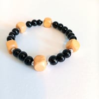 Image 1 of Black bead + wood