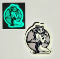Image 1 of Glow In The Dark Woman Holding A Skull & Knealing Before a Pentagram Glossy Finish Vinyl Sticker
