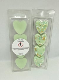 Image 1 of 4 heart clamshell