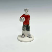 Image 1 of Action(less) Figure: Soccer Player with Red Shirt