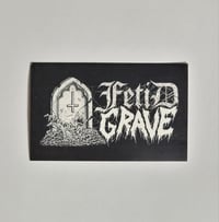 Image 1 of Fetid Grave Upside-Down Cross Tombstone Glossy Finish Vinyl Sticker
