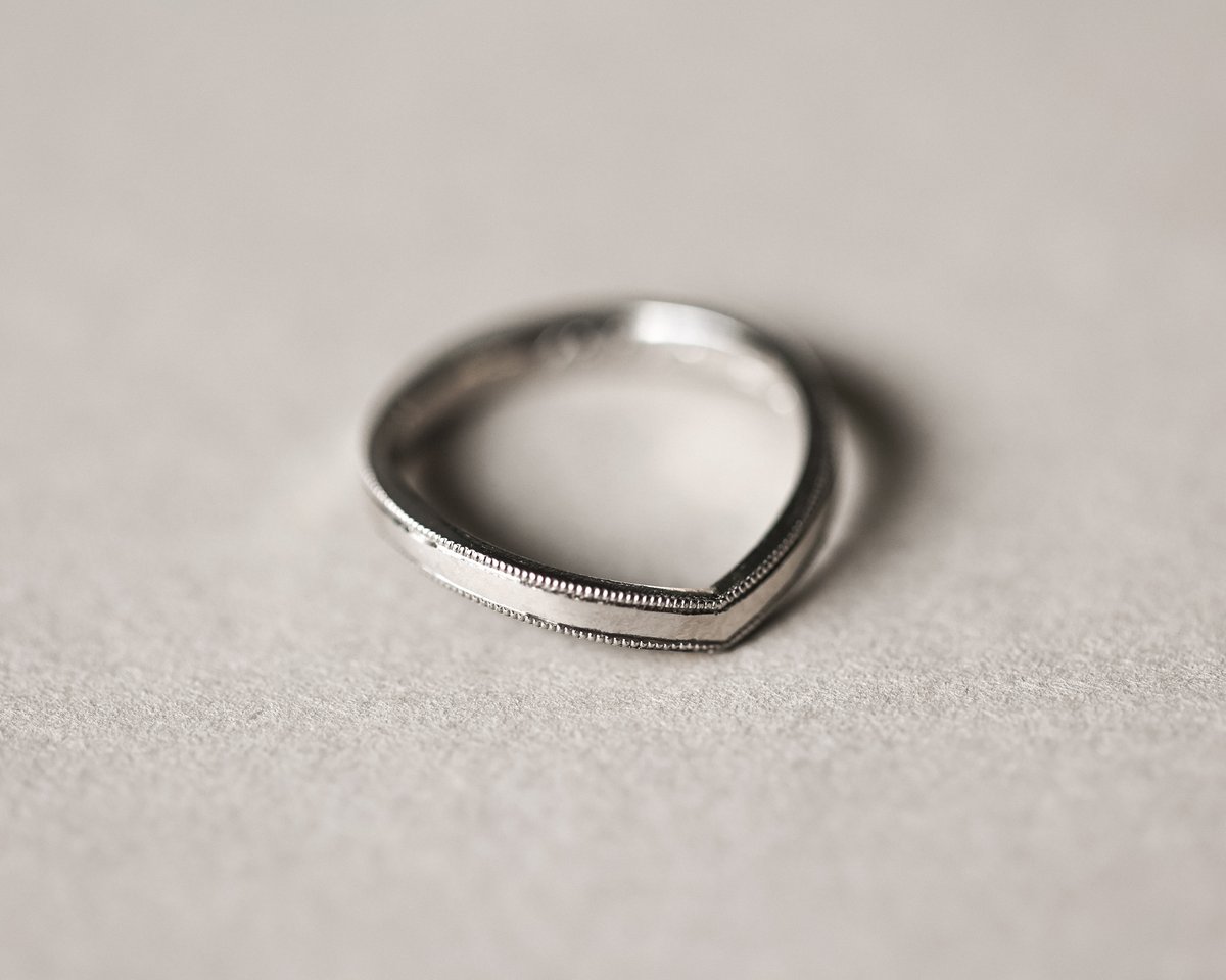 Image of Platinum 2mm width milled edge wishbone shaped ring.