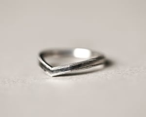 Image of Platinum 2mm width milled edge wishbone shaped ring.