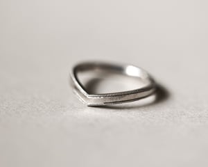 Image of Platinum 2mm width milled edge wishbone shaped ring.