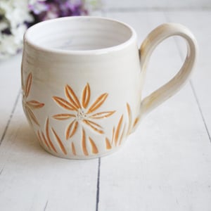 Image of Spring Flowers Carved Coffee Cup in White and Orange Glazes, Gardeners Pottery Mug, Handmade in USA