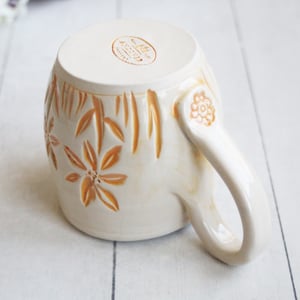 Image of Spring Flowers Carved Coffee Cup in White and Orange Glazes, Gardeners Pottery Mug, Handmade in USA