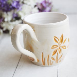 Image of Spring Flowers Carved Coffee Cup in White and Orange Glazes, Gardeners Pottery Mug, Handmade in USA