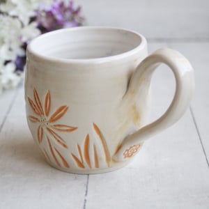 Image of Spring Flowers Carved Coffee Cup in White and Orange Glazes, Gardeners Pottery Mug, Handmade in USA