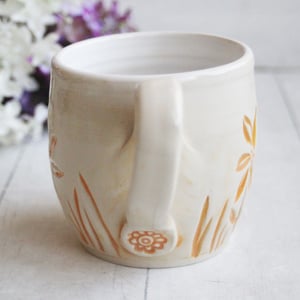 Image of Spring Flowers Carved Coffee Cup in White and Orange Glazes, Gardeners Pottery Mug, Handmade in USA