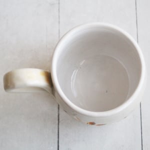 Image of Spring Flowers Carved Coffee Cup in White and Orange Glazes, Gardeners Pottery Mug, Handmade in USA