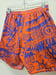 Image of Guice Geometric Monsters Basketball Shorts Orange and Purp