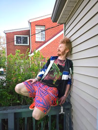 Image 5 of Guice Geometric Monsters Basketball Shorts Orange and Purp
