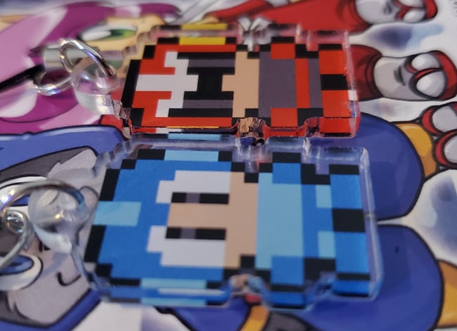 Mega & Proto (Pair)  1 Inch Charms