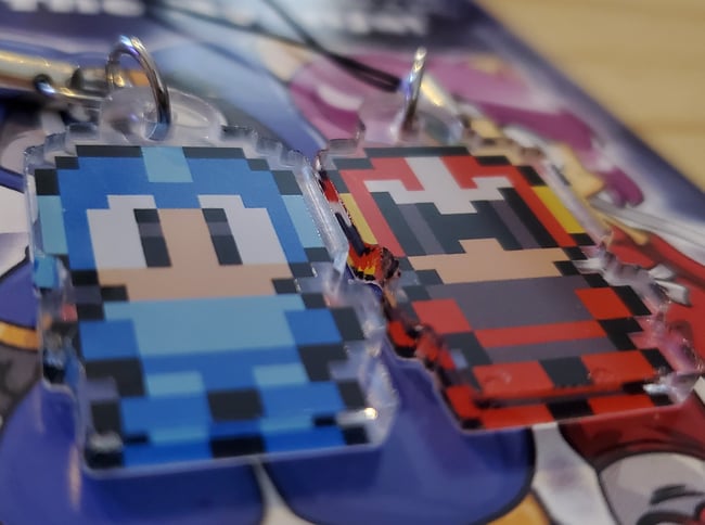 Mega & Proto (Pair)  1 Inch Charms